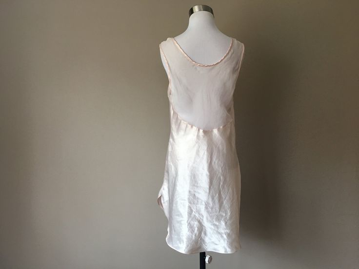 "Measures 20\" across from armpit to armpit. Pink Sara Beth Nightgown. Freshly Laundered Peggy" Fitted Slip For Sleep, Fitted Summer Sleepwear For Wedding Night, Sleeveless Chemise For Pajama Party, Sleeveless Slip Dress Bias Cut For Loungewear, Sleeveless Bias Cut Slip Dress For Loungewear, Sleeveless Bias Cut Summer Nightgown, Fitted Chemise For Summer Sleepover, Sleeveless Summer Wedding Slip, White Fitted Dress For Pajama Party