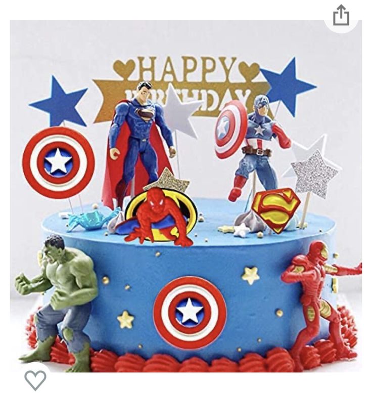 a birthday cake decorated with superheros and stars