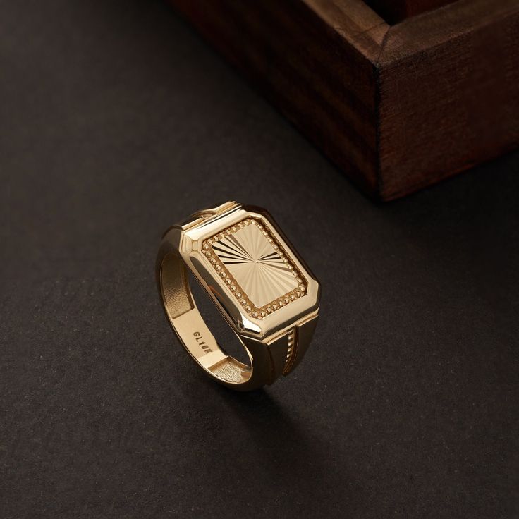 Elevate your style with our 14K Solid Gold Engraved Signet Ring for Men. This handcrafted ring, made from genuine 14K solid gold, is customizable with engravings, making it the perfect gift for husbands and boyfriends. The square signet design adds a touch of classic sophistication, making it a timeless piece of men's jewelry. Celebrate special moments and express your emotions with this exquisite ring, reflecting your unique bond and individual style. -- ⋆ This product is designed with Runda's fine handcrafting with sustainable methods. ⋆ Express-insured shipping to the whole world and delivery to cargo in only 3 business days. ⋆ Free return and warranty Product Details * 14K Real Solid Gold * 6.75 GR 5% -+ * Customizable Size * Yellow - White - Rose Gold Available * Hypoallergenic * Mode Unique Ring Designs For Men, Man Gold Ring Design, Gents Gold Ring Indian, Gold Rings For Men Indian Wedding, Men’s Pinky Ring, Men Gold Ring Design Unique, Gold Rings For Men Unique, Golden Rings For Men, Gold Ring Designs For Men