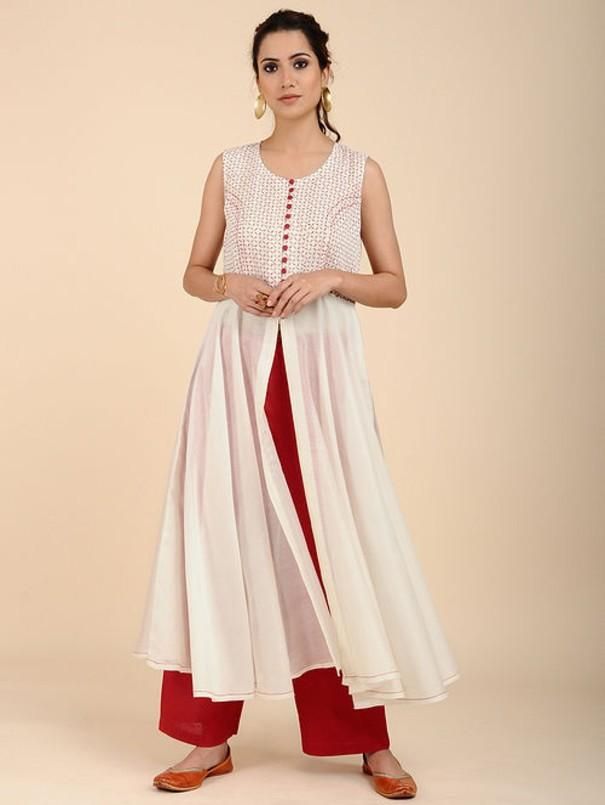 Ivory Red Sleeveless Umbrella Kurta By Sonal Kabra now available at Trendroots White Cutdana Dress For Summer, Traditional White Sleeveless Dress, White Dress With Cutdana For Summer, Sleeveless Chikankari Chanderi Dress, Sleeveless Chanderi Dress With Chikankari Embroidery, White Sleeveless Dress For Navratri, White Sleeveless Anarkali Dress, Festive White Sleeveless Dress, White Sleeveless Cotton Kurta