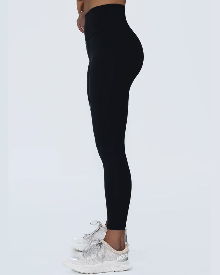 Our Salutation Pants are designed with our buttery-soft and weightless Skin fabric with a high-rise (sits right above your belly button) fit and a 27 in. inseam. These pants are one of our few styles that have no pockets, giving it a super sleek, seamless look, and the ability to style them for the gym or as everyday wear. Womens Size Chart, Belly Button, Black Leggings, The Gym, Everyday Wear, High Rise, Sleek, Womens Sizes, Gym