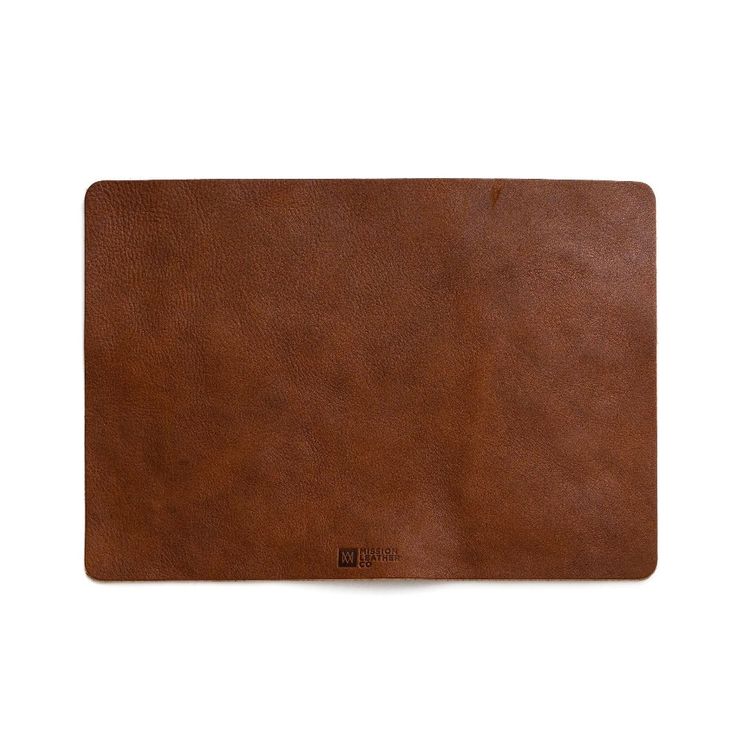 a brown leather place mat on a white background