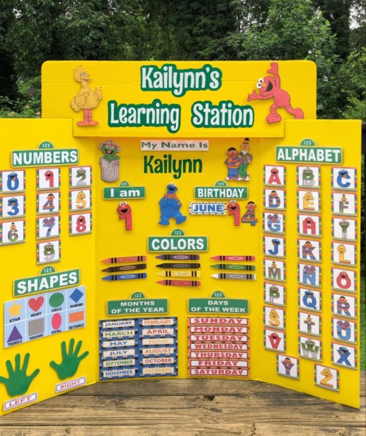 a children's learning station with numbers and pictures on it