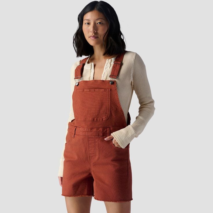 Whether we're collecting wood for the campfire or foraging snacks on our favorite trail, we know we're wearing the Stoic Cotton Canvas Hiking Bib. We built this adventure-ready shortall with rugged canvas that provides the durability we need while in the rough. The stretch fabric and relaxed silhouette keep us moving, and classic overalls features like side buttons and adjustable straps offer comfort and convenience on every trip outside. Utility Cotton Shortalls With Relaxed Fit, Cotton Utility Shortalls With Relaxed Fit, Relaxed Fit Cotton Utility Shortalls, Utility Cotton Overalls For Outdoor, Brown Utility Overalls For Fall, Fall Relaxed Fit Shortalls With Pockets, Casual Cotton Overalls For Outdoor Activities, Casual Overalls With Pockets For Outdoor Activities, Cotton Overalls With Pockets For Outdoor Activities