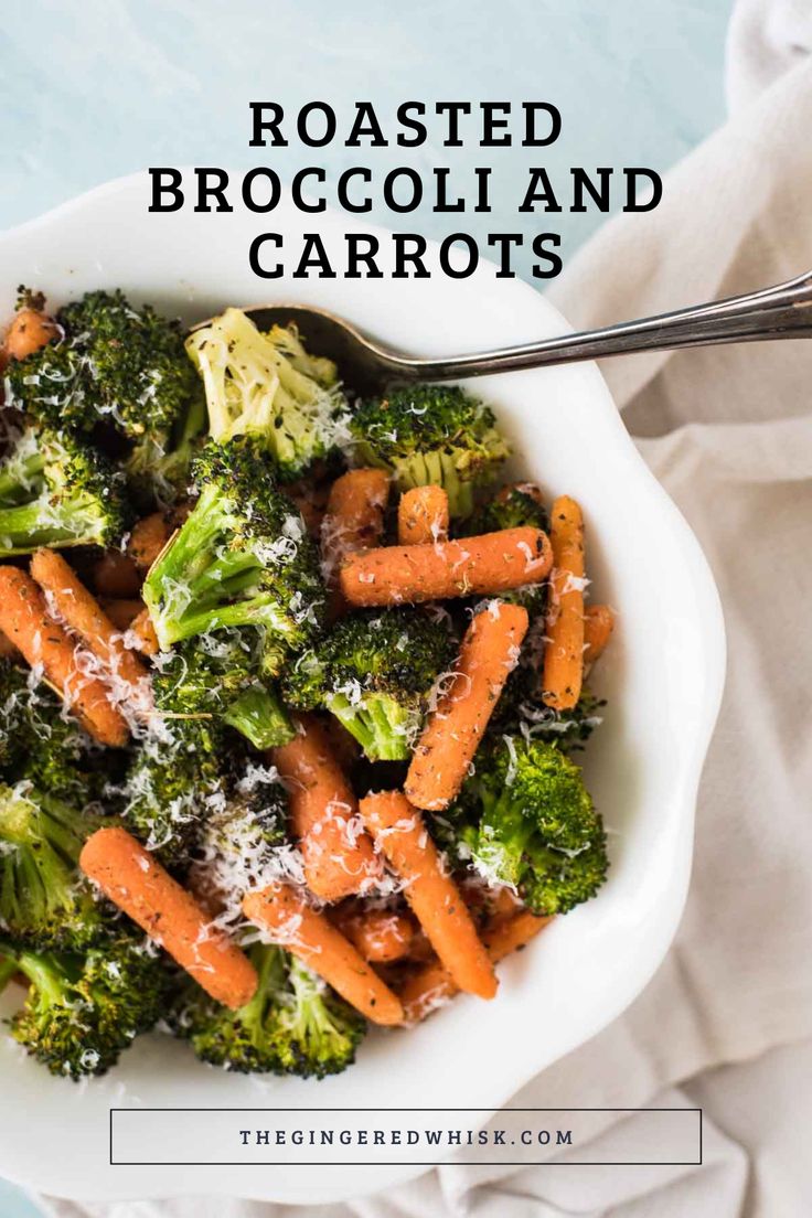 roasted broccoli and carrots with parmesan cheese in a white bowl