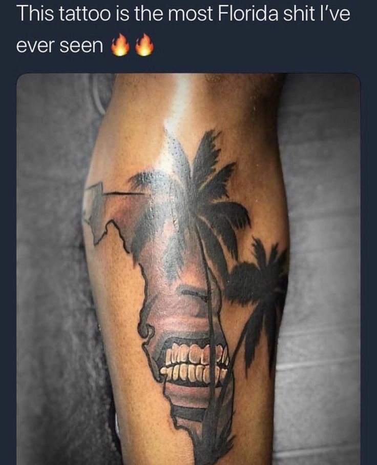 a man with a tattoo on his leg that says, this tattoo is the most florida hit i've ever seen