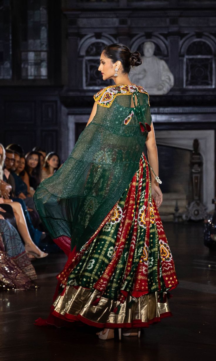 The luxurious CC3803 RIYA lehenga, crafted from sumptuous silk fabric and a silk bandhej dupatta, is exquisitely embroidered and embellished. Perfect for weddings, parties, receptions, dances, and Navratri, this graceful ensemble is sure to elicit admiration and delight. cap not included Green Chaniya Choli, Bandhej Dupatta, Indian Clothing Store, Navratri Chaniya Choli, Dresses Indian, Indian Clothes, Indian Clothing, Chaniya Choli, Embroidered Clothes