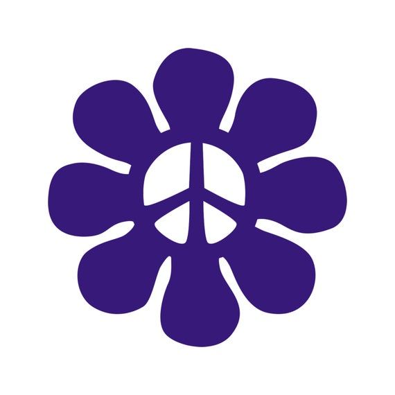 a purple flower with a peace sign on it's center, in the middle