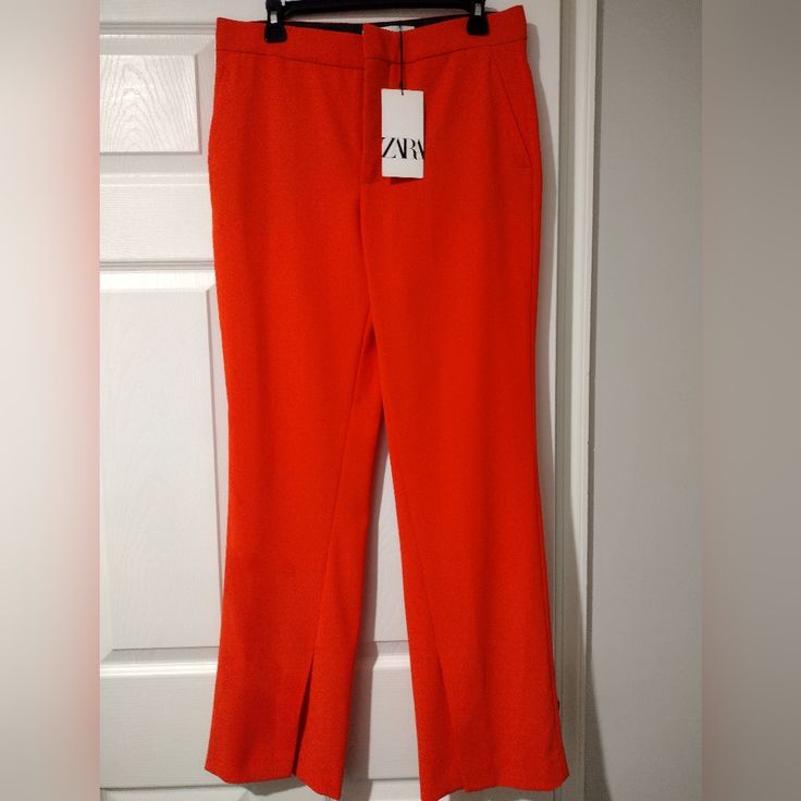 Zara Pants With Slits Chic Wide Leg Pants With Side Slits For Spring, Chic Summer Pants With Side Slits, Chic Bottoms With Side Slits For Spring, Summer Wide Leg Bottoms With Split Design, Chic Straight Leg Pants With Side Slits, Chic Spring Pants With Split Design, Chic Split Design Pants For Spring, Zara Orange Bottoms For Work, Spring Wide Leg Pants With Side Slits