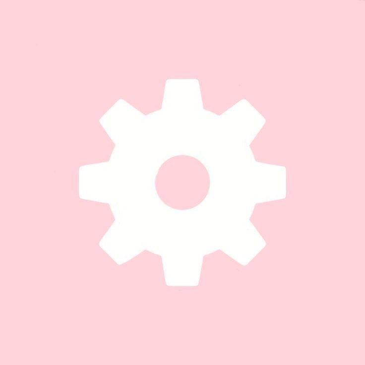 a white cogwheel on a pink background