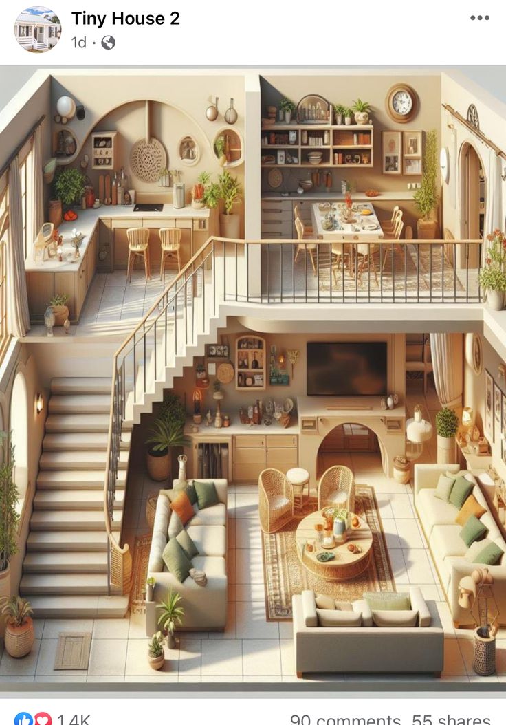 an aerial view of a living room and dining area in a house with stairs leading up to the second floor