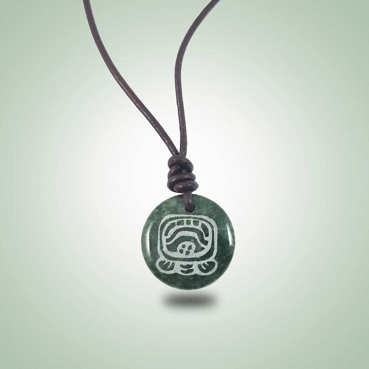 Ajmaq Leather Necklace (26mm) - Jade Maya Symbolic Carved Necklace For Gifts, Adjustable Large Pendant Medallion Necklace Gift, Symbolic Medallion Necklace For Gift, Symbolic Adjustable Etched Necklace, Adjustable Symbolic Etched Necklace, Symbolic Adjustable Etched Necklaces, Handmade Symbolic Medallion Necklace As Gift, Symbolic Etched Adjustable Necklace, Adjustable Etched Symbolic Necklace