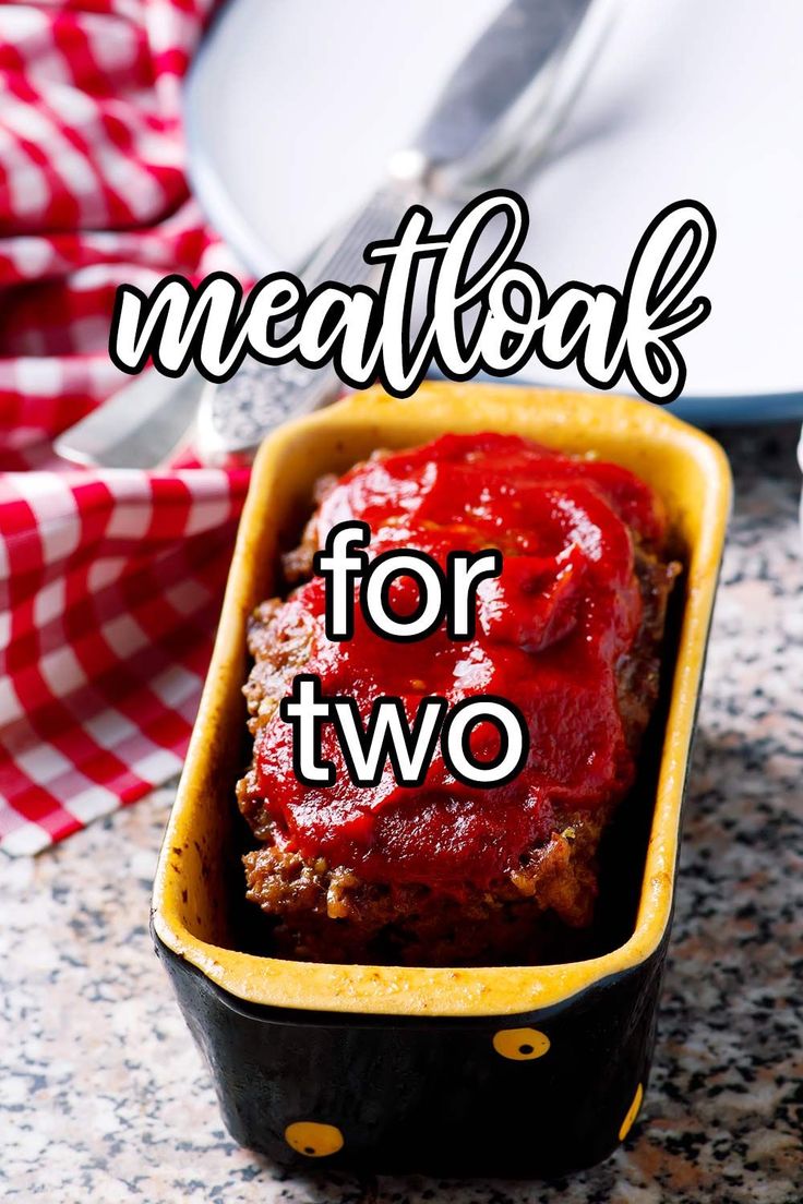 meatloaf for two in a yellow dish with the words meatloaf for two above it