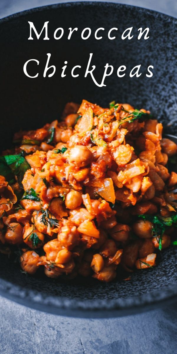 moroccan chickpeas in a black bowl with the title overlay reads moroccan chickpeas