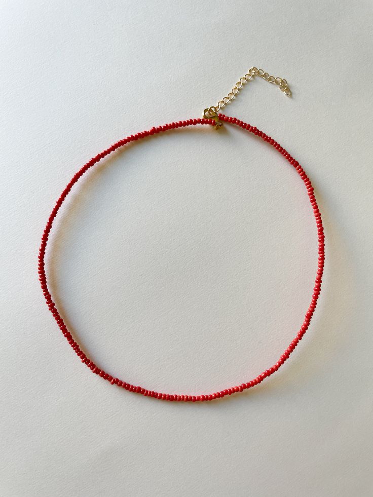 Add a little beaded flair to your accessories with our handmade, micro-beaded wire necklace. Perfect for stacking with your favorite chains, or wearing on its own for a simple, dainty statement. 16 inches + a 2-inch chain extender Affordable Red Beaded Chain, Wire Necklace, Chain Extenders, Ring Bracelet, Earring Necklace, Necklaces Bracelets, Sale Items, Choker, Choker Necklace