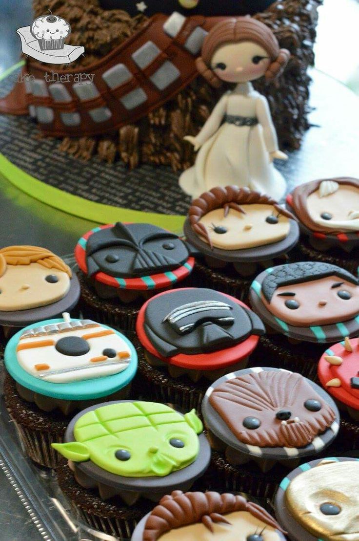 some star wars cupcakes are on a table