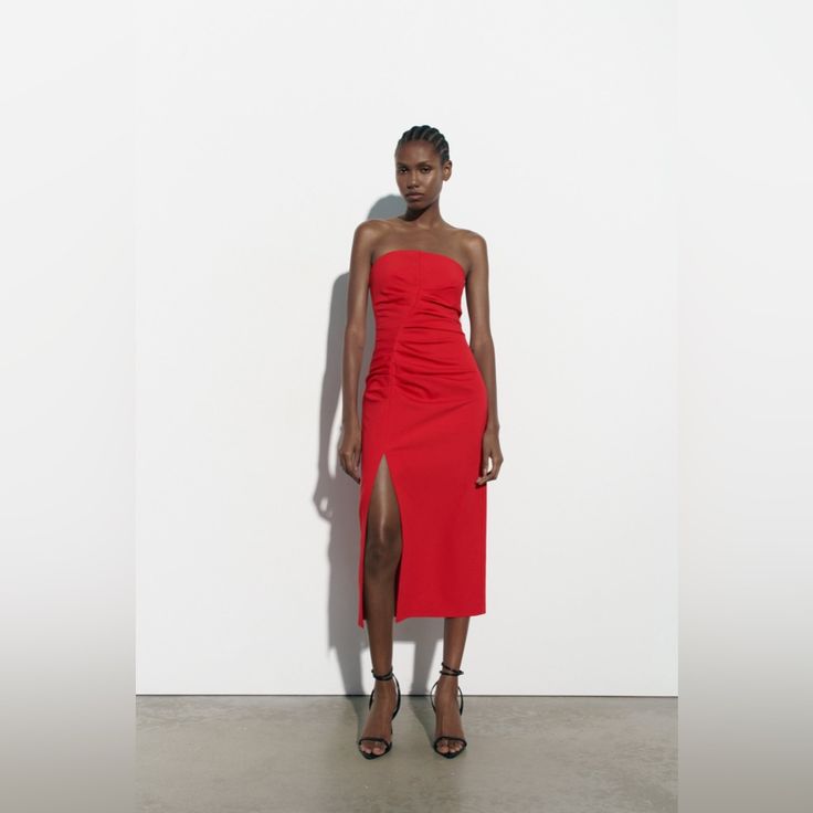 This Stunning Zara Midi Dress Is Perfect For Any Occasion. The Sleeveless Bodycon Style Features A Flattering Ruched Design And A Zip Closure. The Dress Comes In A Gorgeous Red Color And Is Made To Fit Regular Size. It Is Suitable For Wear In All Seasons - Whether It's For A Formal Event Or Casual Wear. The Dress Is Versatile And Can Be Worn To Various Events Such As Weddings, Holy Communion, Parties, Cocktail, Workwear And Business Meetings. It Is A Must-Have Addition To Any Woman's Wardrobe. G Red Sleeveless Maxi Dress With Ruched Bodice, Red Strapless Sleeveless Evening Dress, Red Ruched Sleeveless Dress For Party, Red Midi Dress With Ruched Bodice For Party, Red Midi Dress With Ruched Bodice For Evening, Red Party Midi Dress With Ruched Bodice, Red Evening Midi Dress With Ruched Bodice, Elegant Red Strapless Sleeveless Dress, Red Draped Dress With Ruched Bodice