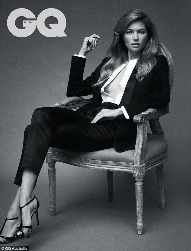 a woman sitting on top of a chair in a black and white photo with the word go written above her