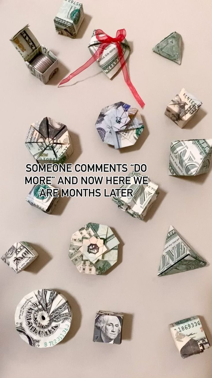 some origami pieces are arranged in the shape of money