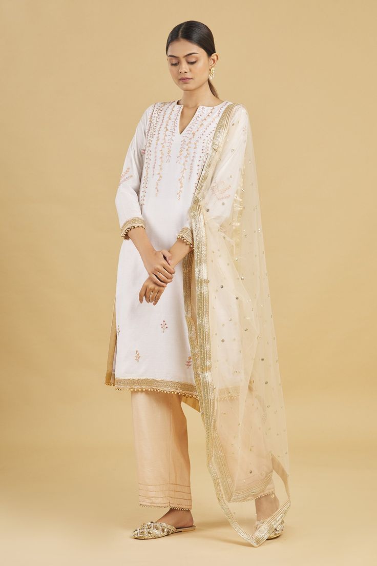 Off white kurta with floral embroidered motifs and lace detail. Paired with lace detailed pant and embroidered net dupatta.
Component: 3
Embroidered
Neckine: Notched
Sleeve Length: Three quarter
Fabric: Chanderi Silk,Net
Color: White
Sheer dupatta
Floral motifs - Aza Fashions Kurta Set For Women, White Kurta, Embroidered Motifs, Women Kurta, Net Dupatta, Straight Kurta, Fashion App, Kurta Set, Embroidered Silk