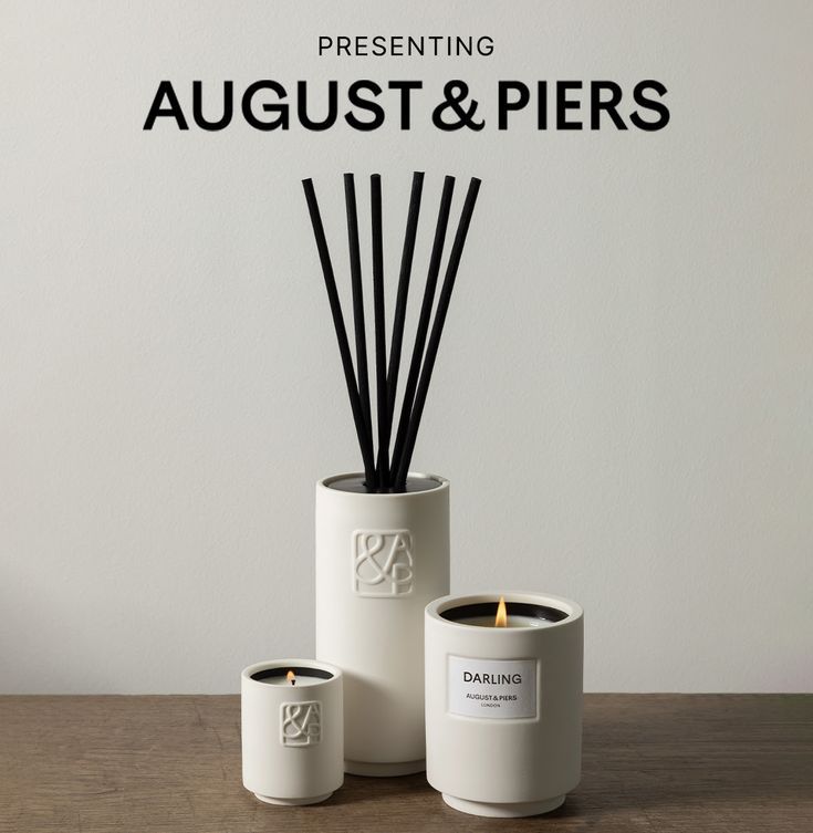 an image of candles on a table with the words august & piers