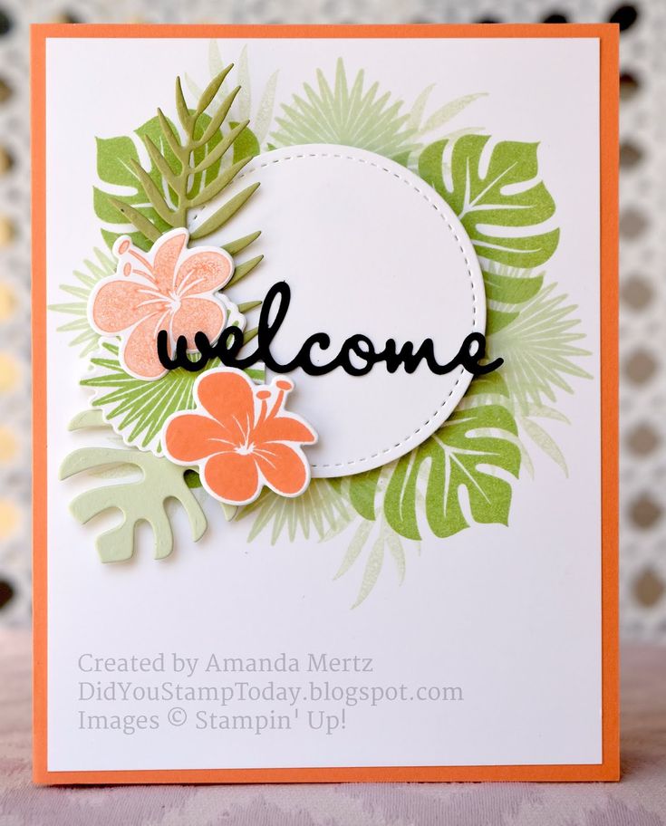 a welcome card with tropical leaves and flowers