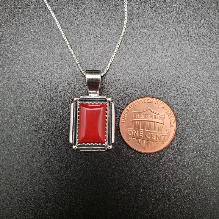 Visit our on-line shop at: Etsy.com/shop/AlbuquerqueDesigns *sterling silver necklace pendant *rectangle shape pendant with silver box chain necklace 18 inches long *southwestern jewelry *red coral *calibrated pre-cut stones in millimeter and shape of stone: 14x10nn rectangle shape *back of jewelry items are all covered / do not show the back of stones *all jewelry items are made to ship, slight variations in stones will occur comparing to pictures. *size of a penny is 19mm or a dime is 18mm in Turquoise Heart Earrings, Southwestern Necklace, Red Coral Necklace, Silver Necklace Pendant, Turquoise Drop Earrings, Box Chain Necklace, Silver Post Earrings, Turquoise Heart, Coral Necklace