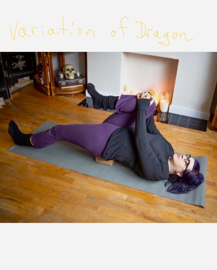 a woman is laying on her stomach in a yoga pose with the caption variation of dragon