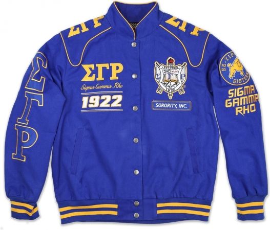 a blue jacket with yellow and white lettering on the front, along with other patches