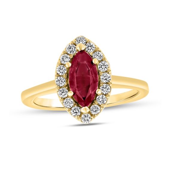 Top off your dressy looks with this marquise-cut red ruby and diamond frame ring, a timeless design that elevates your attire with ease. Created in 14K gold The 10.0 x 5.0mm marquise-cut bright red ruby glistens in a frame of shimmering diamonds. Underneath the centerpiece, sculpted leaf-like marquise shapes add nature-inspired elegance to the style. This classic choice sparkles with 1/4 ct. t.w. of diamonds. Marquise Red Diamond Ring, Red Marquise Ruby Ring With Prong Setting, Red Ruby Ring With Marquise Cut Diamond, Formal Red Marquise Cut Cluster Ring, Red Marquise Ring With Diamond Accents, Red Marquise Diamond Accent Rings, Red Marquise Diamond Ring Fine Jewelry, Red Marquise Rings With Diamond Accents, Marquise Ruby Cluster Ring In Fine Jewelry Style