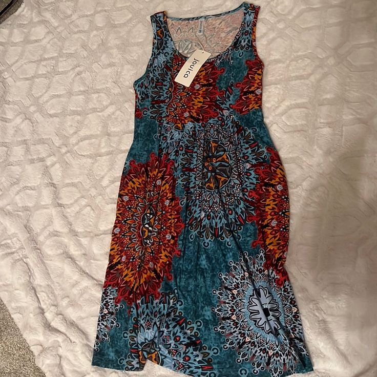 Nwt - Boho Dress. Never Worn, Hippie And Really Cute. Could Be A Sun Dress Or Pool Color. Bundle & Save! Casual Multicolor Knee-length Sundress, Casual Dresses With Vibrant Print, Casual Sundress With Vibrant Print, Casual Maxi Dress With Vibrant Print, Casual Sleeveless Midi Dress With Vibrant Print, Casual Midi Sundress With Vibrant Print, Bohemian Sleeveless Midi Dress In Multicolor Print, Blue Sleeveless Midi Dress With Vibrant Print, Casual Blue Maxi Dress With Vibrant Print