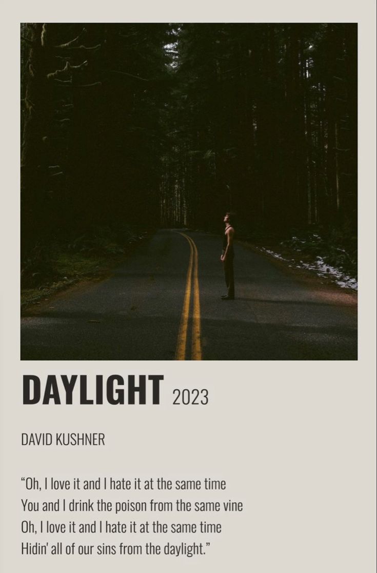 a person standing on the side of a road in front of trees and text that reads daylight