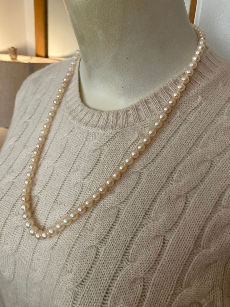 Beautiful lustrous vintage baroque akoya cream pearl necklace with 14k gold clasp. 24", 6-8 mm pearls. Pretty creamy white color with thick nacre. Nice classic pearl necklace that comes in a cream suede drawstring pouch. Classic Single Strand Pearl Necklace With Round Beads, Vintage Akoya Pearl Drop Necklace, Classic Gold Pearl Necklace, Classic Formal Pearl Necklace With Round Beads, Classic Pearl Necklace For Formal Occasions, Formal Classic Pearl Necklace, Classic Pearl Drop Jewelry, Classic Single Strand Pearl Necklace Gift, Classic Single Strand Pearl Necklace As Gift