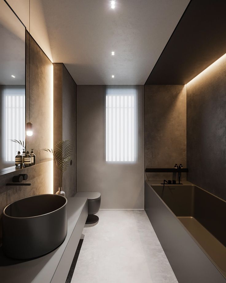 a modern bathroom with two sinks and mirrors