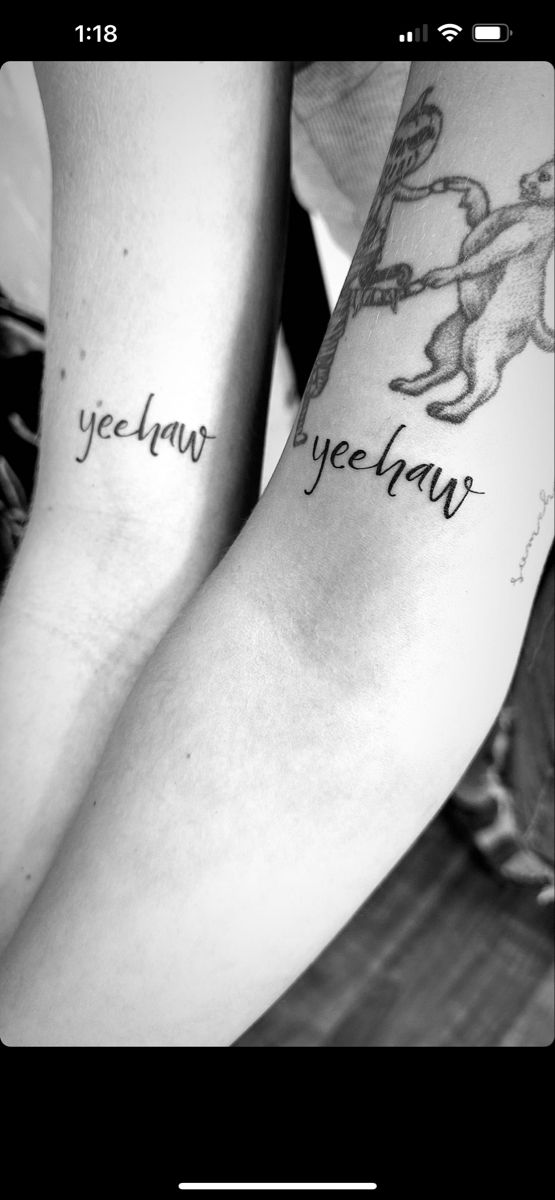 two people with tattoos on their arms that say yeelnaw and yyeepean