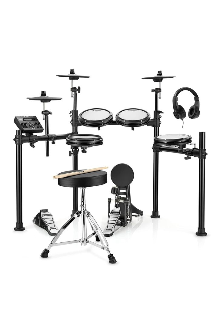 an electronic drum set with headphones and pedals