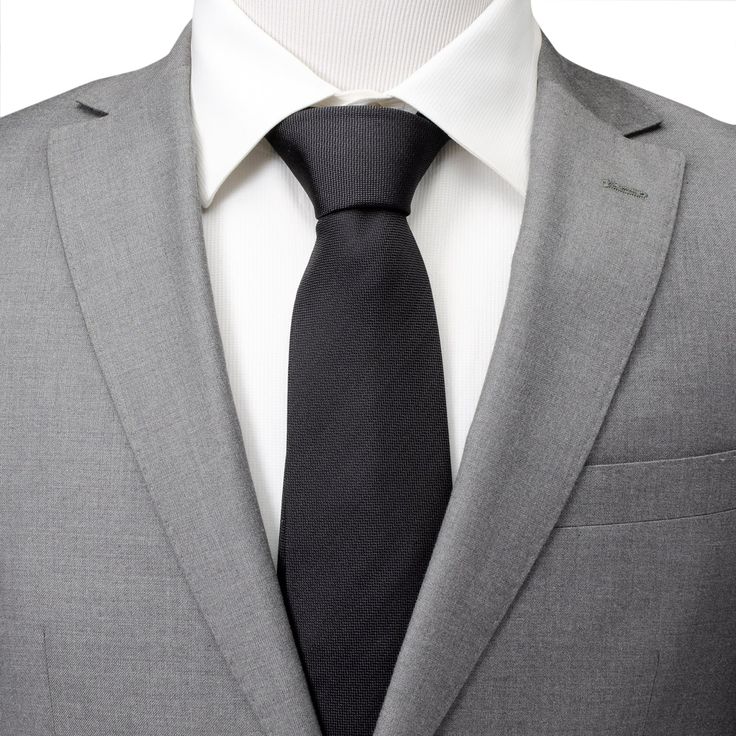 Show up to your black tie event with confidence with this classic black tie. Made with 100% silk. Luxury Striped Ties For Black Tie Events, Elegant Business Suits, Fitted Tie For Black Tie Events, Fitted Standard Tie For Black Tie Events, Classic Fitted Ties For Formal Occasions, Elegant Tailored Ties For Business, Elegant Ties For Work, Tailored Elegant Ties For Business, Elegant Solid Color Ties For Work