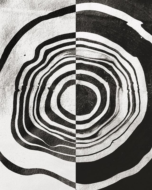 two different black and white images with circles