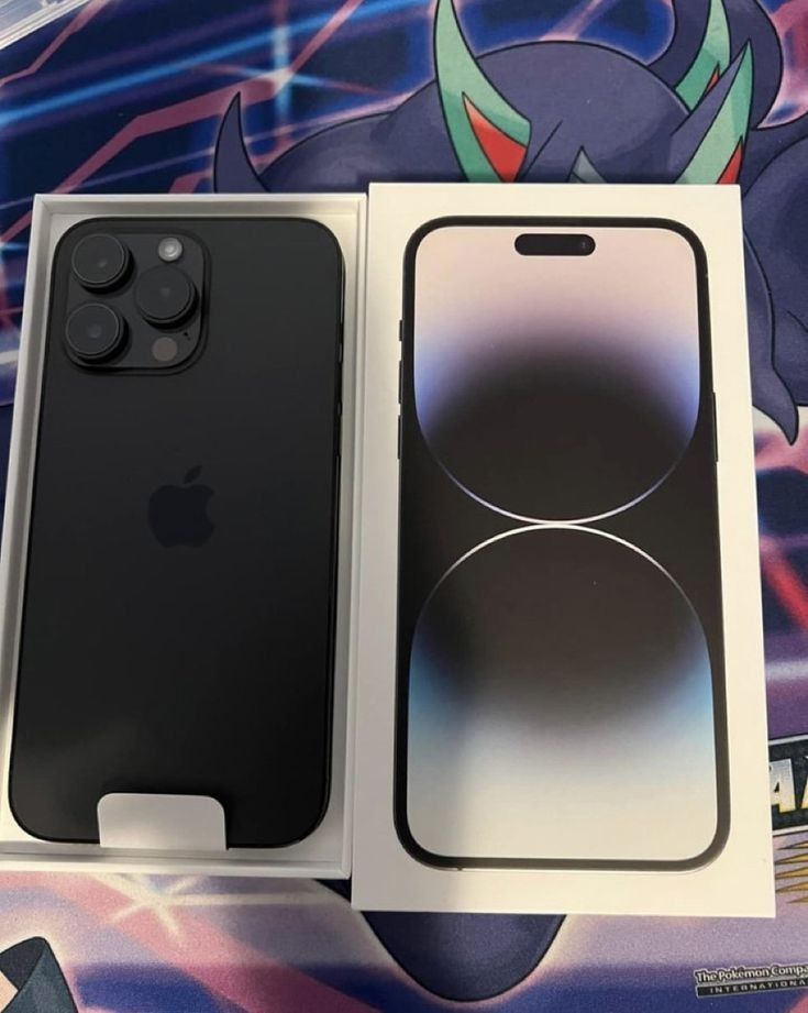 an apple iphone 11 pro in its box with the new packaging on it's side