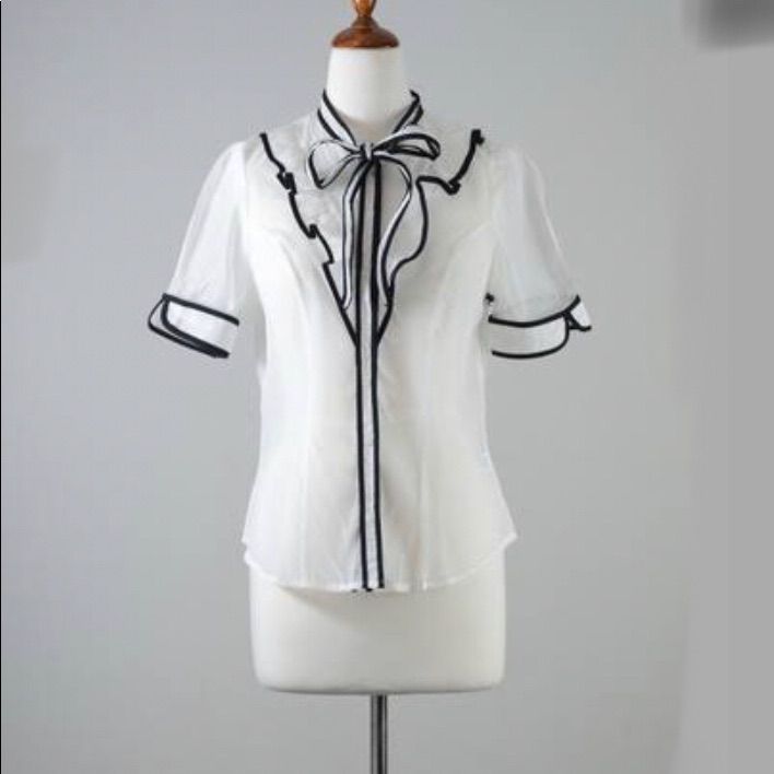 New With Tags Haute Monde Short Sleeve Blouse. Size Large. Ties At Neck. Button Up. Sheer. No Trades Bin 100 (145) White Office Blouse With Collar, White Office Lady Tops For Work, White Office Lady Top With Button Closure, White Summer Office Blouse, Formal White Tops For Office Ladies, Formal White Tops For Office, Formal White Office Lady Top, White Button-up Office Lady Blouse, White Button-up Office Blouse