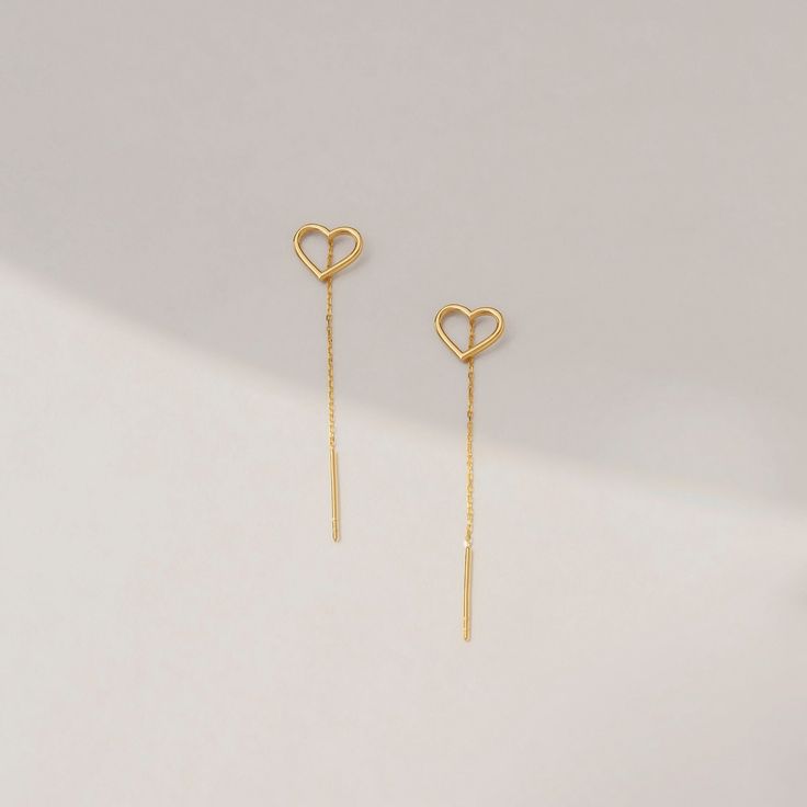 14k Real Gold Dangling Open Heart Earrings is no better way to express your love. Find the long line that connects your heart to hers. Choose a special day to celebrate your love, whether it's a birthday, an anniversary, or simply a regular Friday. D E T A I L S   * Made to Order. * 100% 14k Solid Gold * Choice of Gold Color: Yellow Gold, Rose Gold, White Gold * Chain length: 50 mm / 1.96 inch * Chain thickness: 1 mm / 0.03 inch * Charm width: 10 mm / 0.39 inch * Charm length: 8 mm / 0.31 inch * 14k Yellow Gold Dangle Threader Earrings, Sterling Silver Dangle Heart Earrings, Tarnish Resistant, Dainty Linear Earrings For Anniversary, Elegant Gold Plated Heart Pendant Earrings, Tarnish Resistant Sterling Silver Dangle Heart Earrings, Classic Dangle Earrings For Valentine's Day, Anniversary Yellow Gold Linear Earrings, Valentine's Day Classic Dangle Earrings, Classic Valentine's Day Dangle Earrings