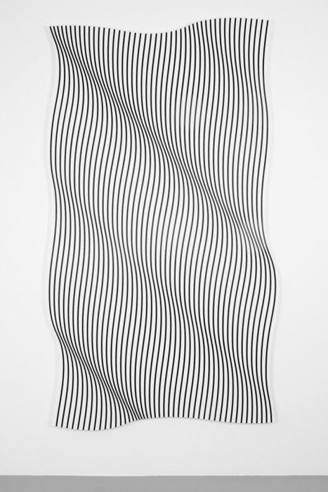 black and white wavy lines on a white wall