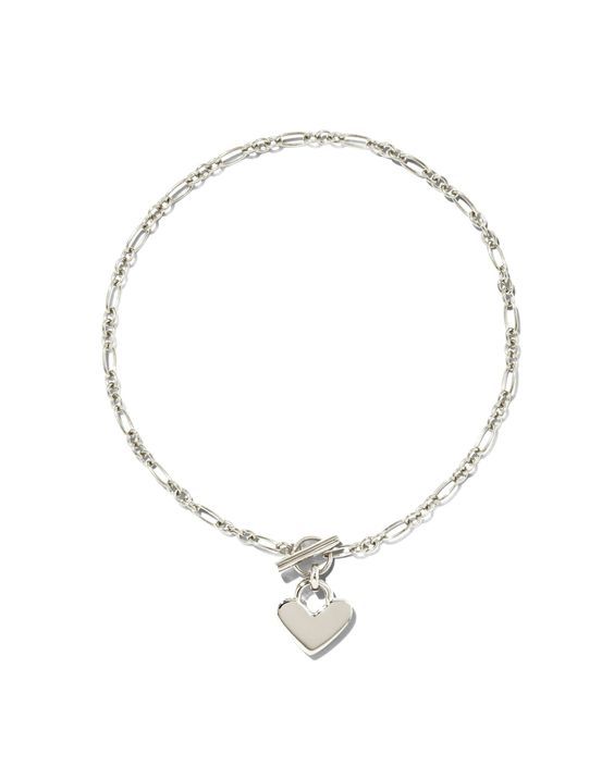 Add this flirty, fun bracelet to your everyday essentials. The Heart Padlock Chain Bracelet in Sterling Silver is the perfect statement piece to layer or wear alone. Pair with just about any outfit to complete the look. Metal Sterling Silver Why Sterling Silver? Our Sterling Silver collection features elevated styles to wear time and time again. With a base of both pure silver and copper, Sterling Silver provides a precious yet affordable option that offers long-lasting wear and shine and is the perfect addition to your Demi-Fine jewelry rotation. Learn More About Metals & Care Closure Toggle Clasp Size 7" Chain,0.48"L X 0.48"W PendantDue to the one-of-a-kind nature of the medium, exact colors and patterns may vary slightly from the image shown. | Kendra Scott Heart Padlock Chain Bracelet Trendy Sterling Silver Charm Bracelet For Everyday, Trendy Sterling Silver Chain Bracelet With Lobster Clasp, Trendy Jewelry With Heart Pendant And Toggle Clasp, Trendy Heart Pendant Jewelry With Toggle Clasp, Everyday Metal Chain Bracelet With Heart Charm, Trendy Everyday Charm Bracelet With Heart Charm, Chic Silver Jewelry With Heart Charm, Everyday Charm Bracelet With Heart Charm, Metal Heart Bracelet For Everyday