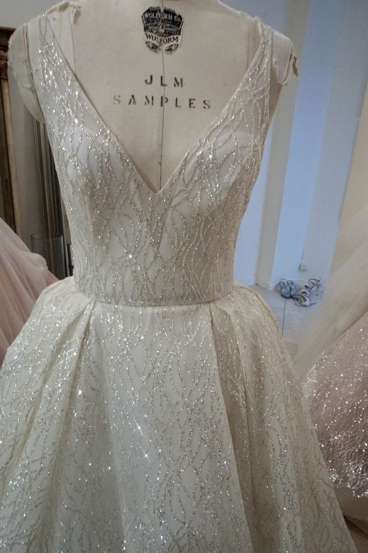 a white dress on display in a store