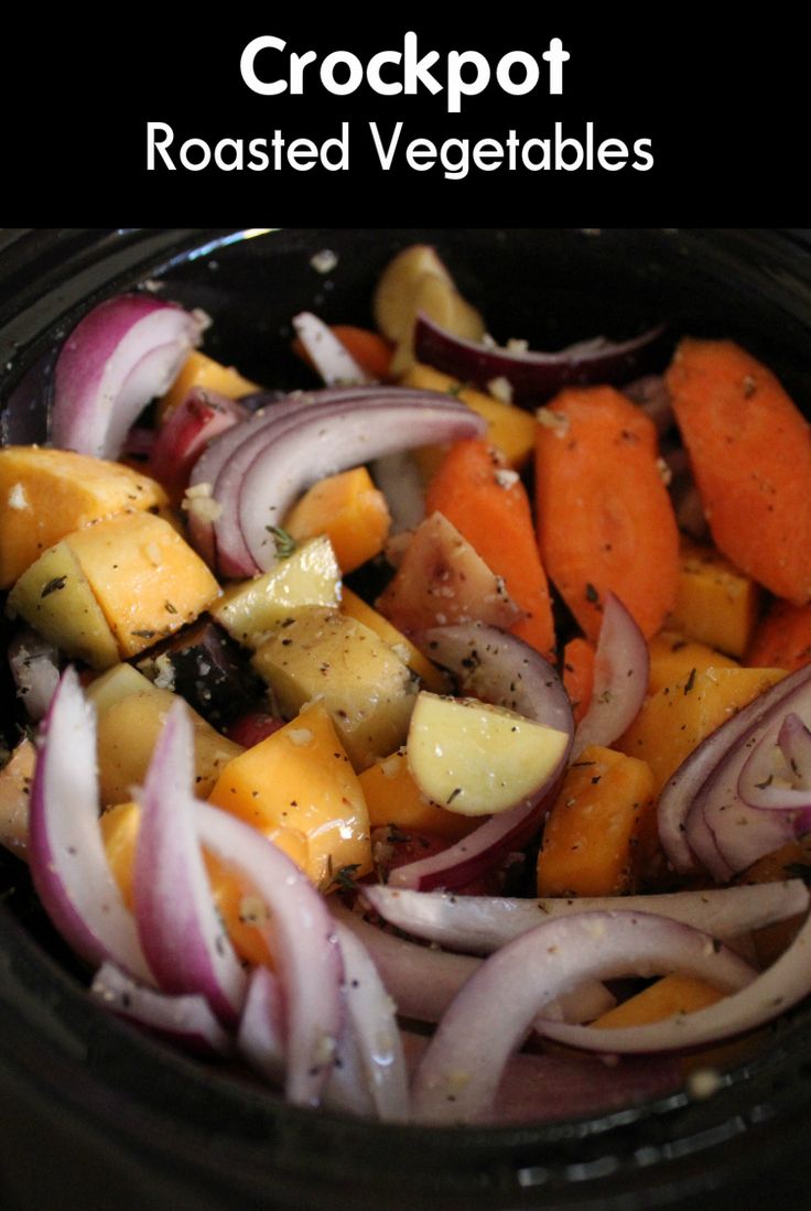 a close up of a plate of food with onions and carrots