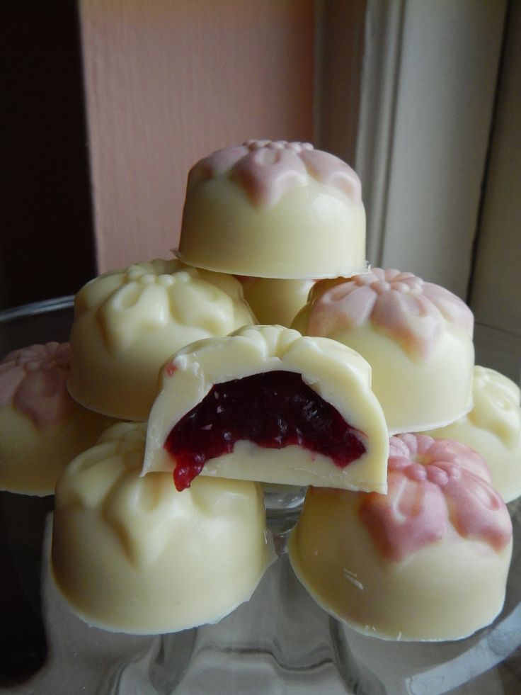 some kind of dessert sitting on top of a glass plate in front of a window