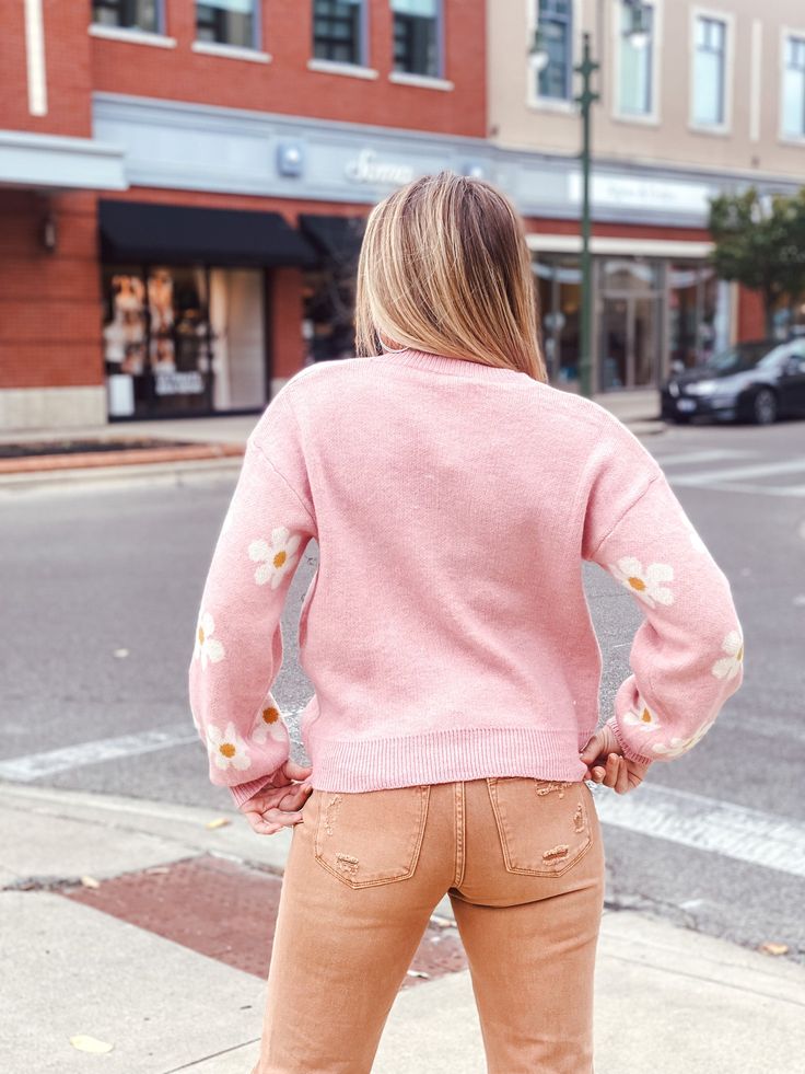 Add a fun and unique flare to your wardrobe in 2PM's Flower Power Sweater ! This sweater features soft and stretchy knit material , a relaxed fit and a beautiful ivory and pink floral pattern. This piece pairs perfectly with denim or a khaki's for the cutest look! Spring Crew Neck Feminine Sweater, Spring Feminine Crew Neck Sweater, Feminine Spring Crew Neck Sweater, Floral Print Sweater For Fall, Pink Sweater For Fall Day Out, Feminine Soft Knit Sweater For Spring, Feminine Sweater For Fall Day Out, Feminine Fall Sweater For Day Out, Feminine Sweater For Day Out In Fall