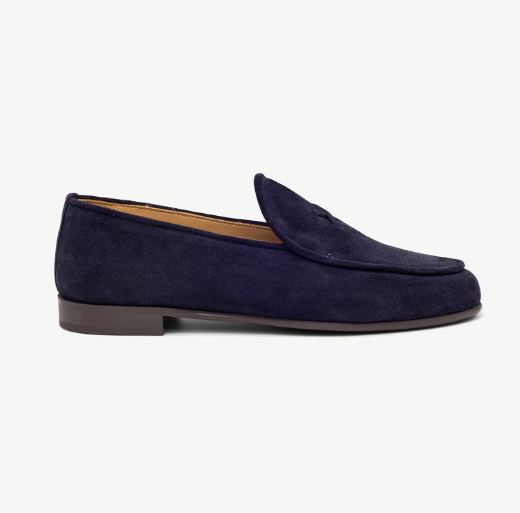 Our classic Navy Suede Milano Loafer, now in Women's sizing, is made with luxurious Italian suede and a custom rubber sole that looks as good as it feels. Size down half a size from your most common sneaker size Handmade in Italy Suede exterior with red stitching on heel Leather lining and cushioned leather footbed Rubber sole for traction and all-day comfort Elegant Moccasins With Suede Lining For Business Casual, Elegant Suede Lined Loafers For Business Casual, Elegant Business Moccasins With Suede Lining, Modern Formal Loafers With Suede Lining, Elegant Loafers With Suede Lining For Galas, Elegant Loafers For Galas, Elegant Formal Moccasins With Suede Lining, Luxury Suede Lined Loafers For Formal Occasions, Elegant Tassel Loafers With Suede Lining For Formal Occasions