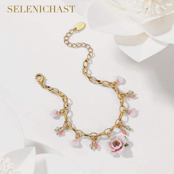 Plating: 18K Gold Materials: 18K Gold on Brass, Enamel Size: Length:6.69"(17cm)+Extender: 2.17"(5.5cm) Weight: 17.9g Hypoallergenic design Delicate Rose Jewelry, Feminine Rose Gold Jewelry With Flower Decoration, Pink Adjustable Chain Charm Bracelet, Flower Shaped Crystal Bracelet Gift, Spring Rose Gold Flower Bracelets, Adjustable Feminine Crystal Bracelet, Spring Rose Gold Flower Bracelet, Rose Gold Flower Beaded Bracelets For Gift, Rose Gold Flower Beaded Bracelets As Gift