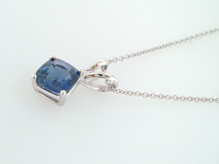 "HERE IS BEAUTIFUL CUSHION CUT CEYLON BLUE SAPPHIRE SOLITAIRE PENDANT NECKLACE 14 KARAT WHITE GOLD AVAILABLE YELLOW OR ROSE GOLD TOO ASK ME PLEASE COMES WITH 16\" OR 18\" INCH CHAIN CENTER CUSHION CUT CEYLON BLUE SAPPHIRE VERY SWEET LIGHT BLUE COLOR & CLEAN SAPPHIRE !! CENTER SHAPE- CUSHION CUT CUT- VERY GOOD CLARITY- AA COLOR- BLUE CARAT- 1.16ct MEASUREMENT- 5.95 X 5.90 mm TOTAL 1.16 CARAT RETAIL PRICE IS OVER $2,800.00 COMES WITH $2,250.00 CERTIFIED APPRAISAL !! DREAM IT I\"LL MAKE IT SPEC Luxury Blue Diamond-cut Necklace, Formal Cushion Cut Gemstone Necklace, Formal Blue Diamond Cut Necklace, Elegant Blue Hallmarked Necklace, Formal Blue Diamond Cut Necklaces, Formal Blue Hallmarked Necklace, Formal Blue Hallmarked Necklaces, Formal Hallmarked Blue Necklaces, Sapphire Cushion Cut Jewelry Gift